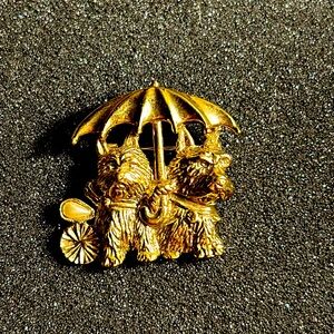 Puppies with umbrella pin and rain drop detail